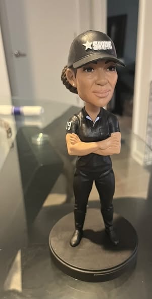 She Calls It All Bobblehead